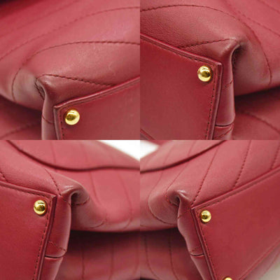 CHANEL  Calfskin Chevron Stitched Small Coco Flap Bag Red