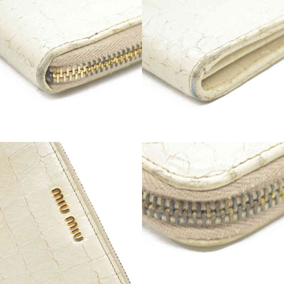 MIU MIU Logo Embossed Leather Zippy Long Wallet White