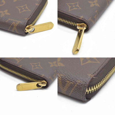 $915 Louis Vuitton  Monogram Zippy Wallet