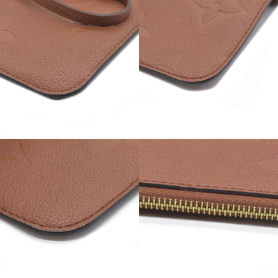 $2940 Louis Vuitton  Empreinte Monogram Giant Neverfull MM Pochette Cognac
