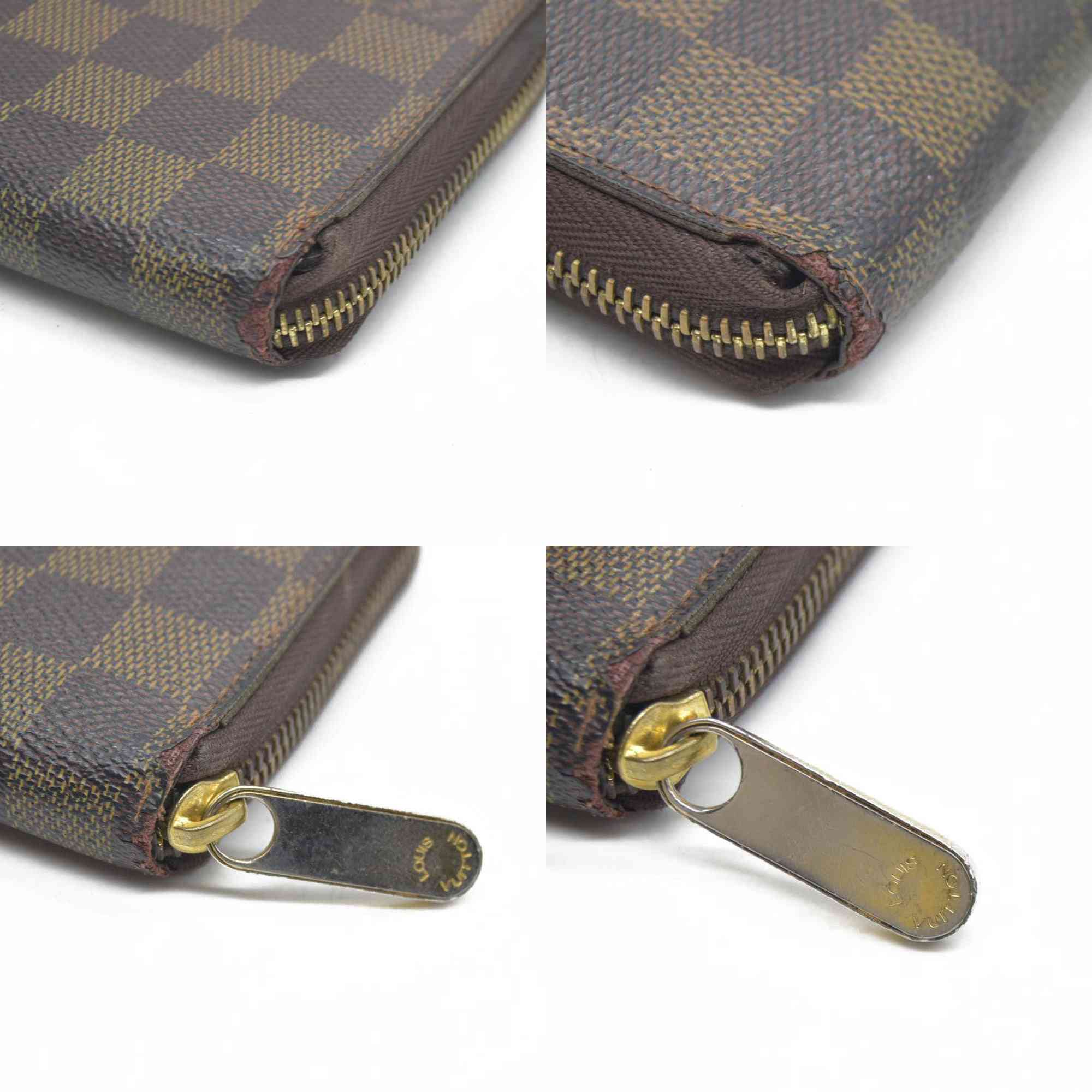 AUCTION $915 Louis Vuitton Damier Ebene Zippy Wallet