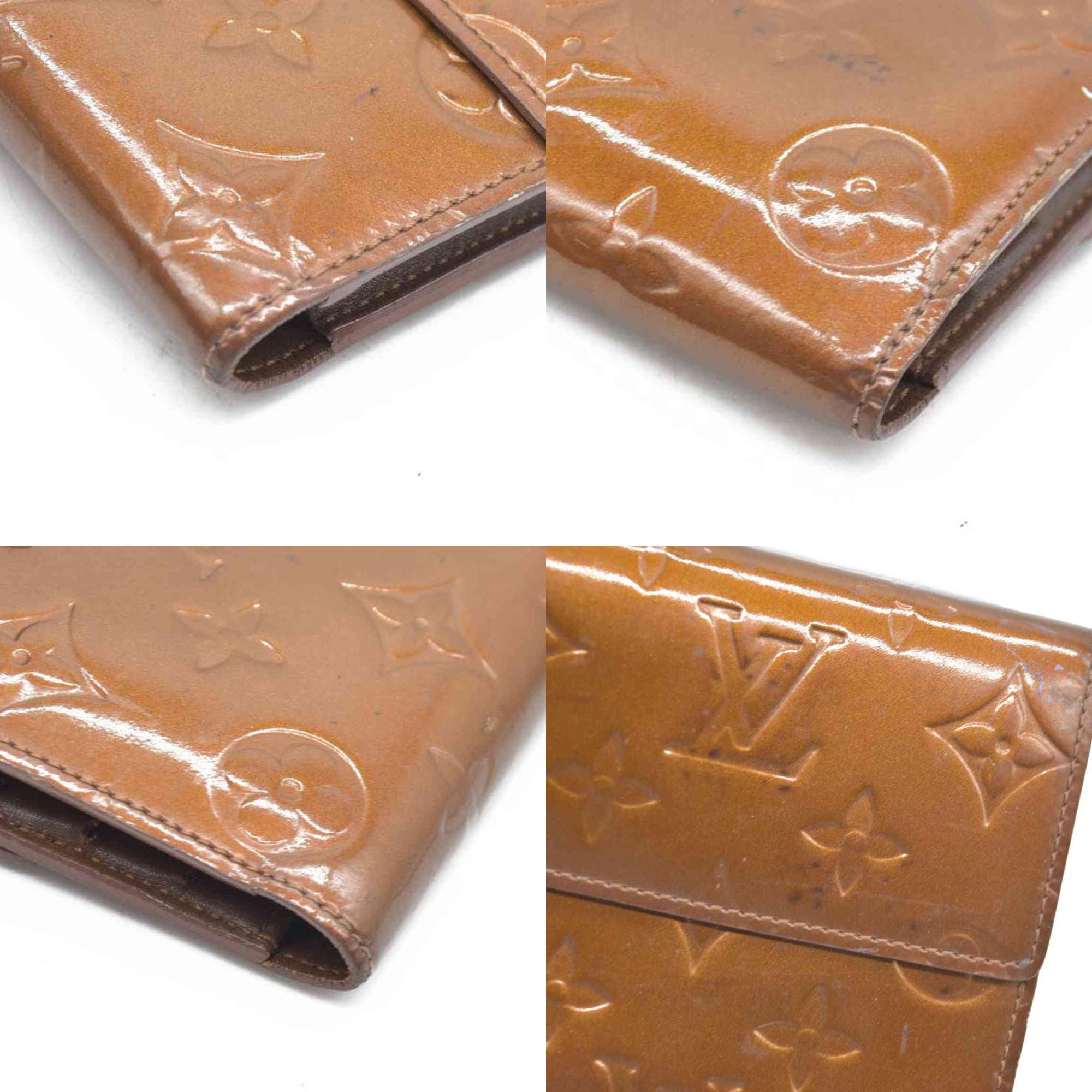 $840 LOUIS VUITTON Monogram Vernis Porte Tresor International Trifold Wallet