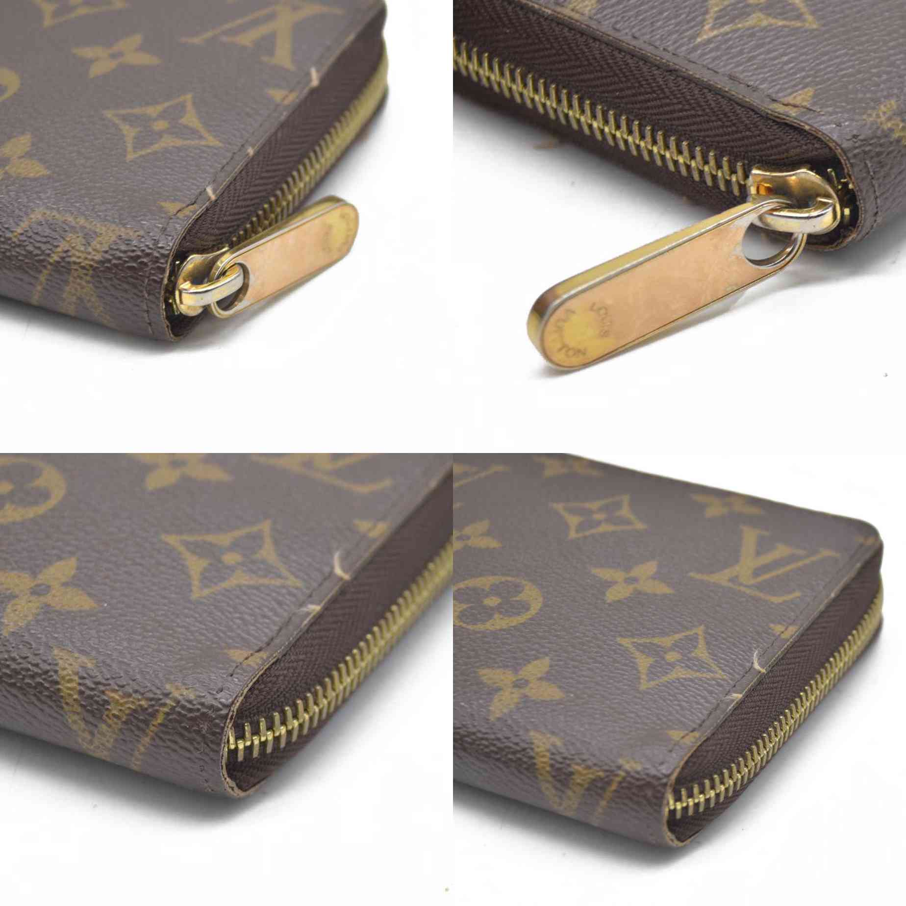 AUCTION $915 Louis Vuitton  Monogram Zippy Wallet CA5039