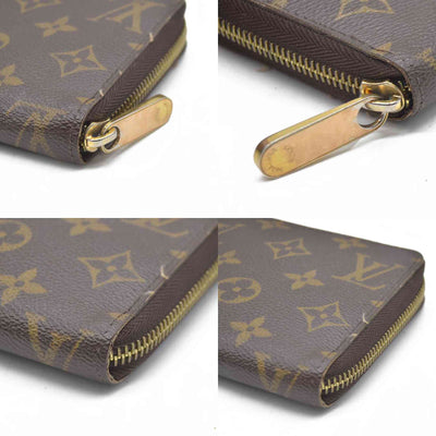AUCTION $915 Louis Vuitton  Monogram Zippy Wallet CA5039
