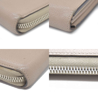 $1420 Louis Vuitton  Veau Cachemire Comete Wallet Galet MI5126