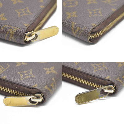 AUCTION $915 Louis Vuitton Monogram Zippy Wallet