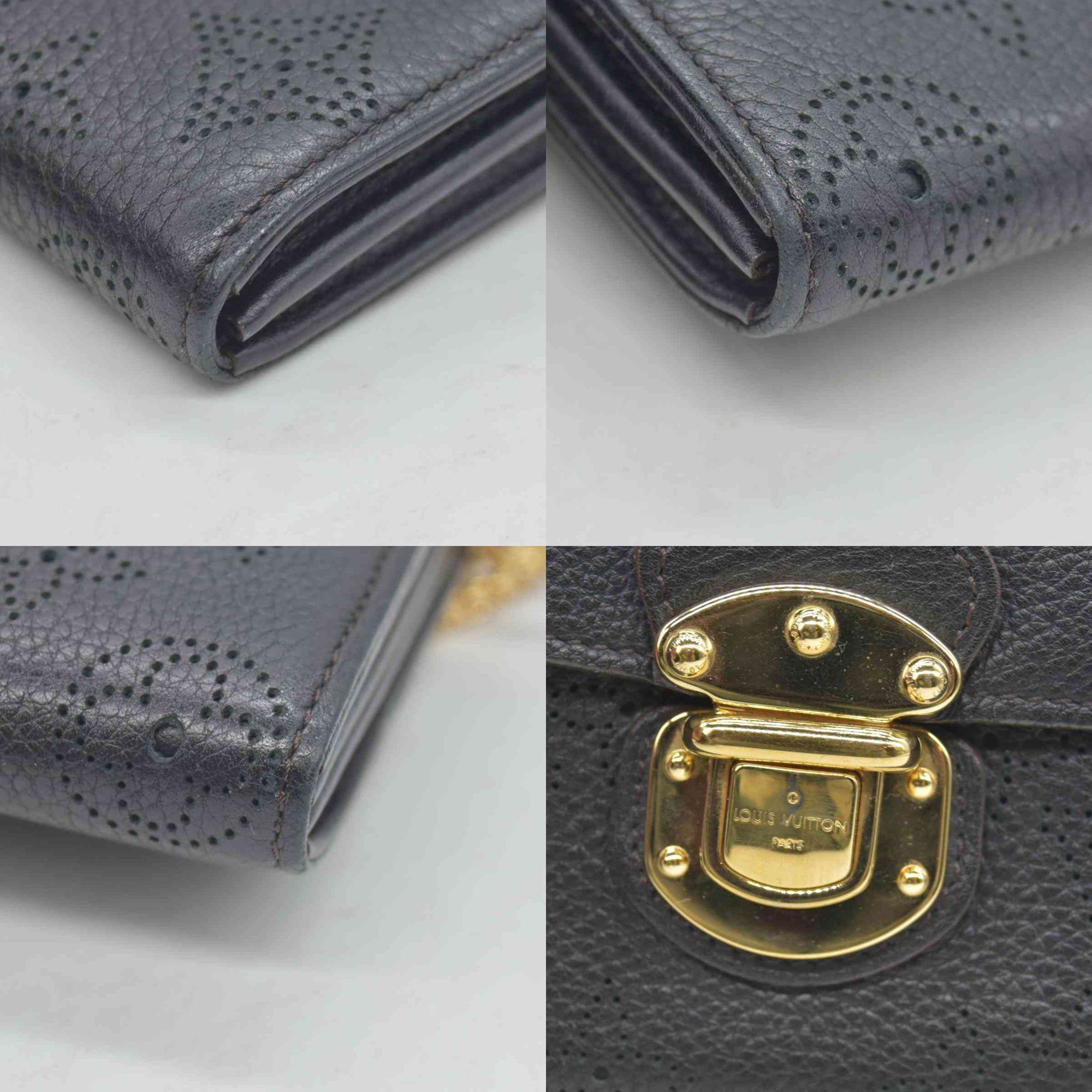 $1130 2014 Louis Vuitton Mahina Amelia Wallet Black CONSIGNMENT TN0184