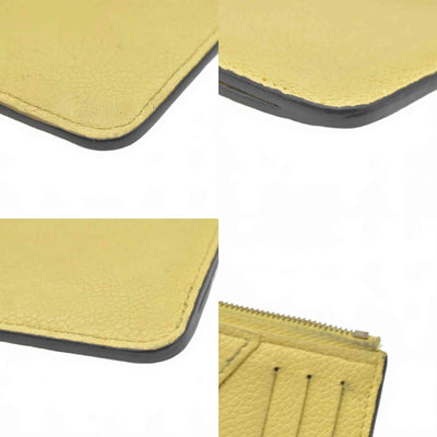 Louis Vuitton Monogram Empreinte Leather Zipped Romy Card Holder Yellow