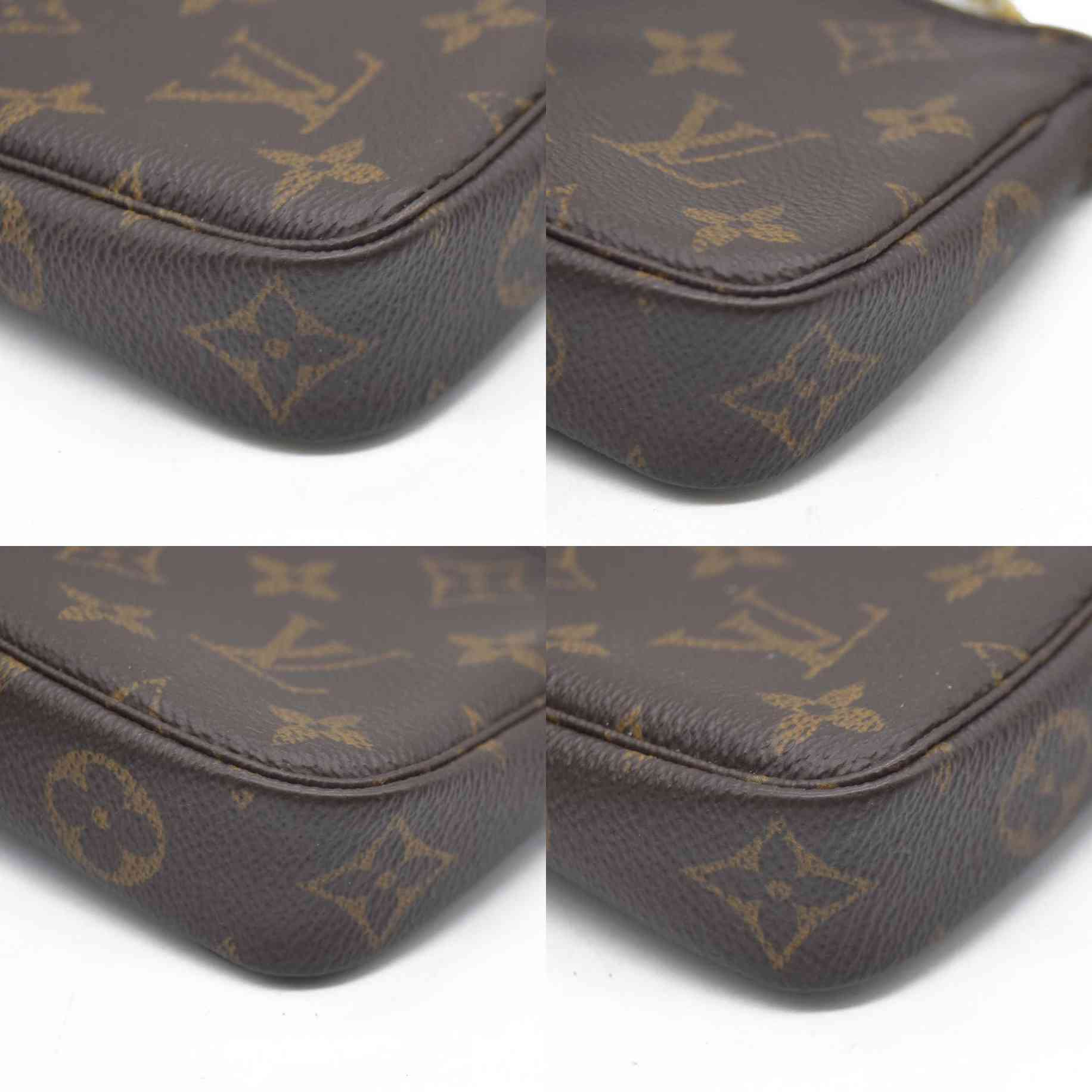 AUCTION  $1050 Louis Vuitton Monogram Mini Pochette Accessories SP2158
