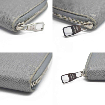 AUCTION $985 Louis Vuitton  Taiga Zippy Organizer Wallet Glacier