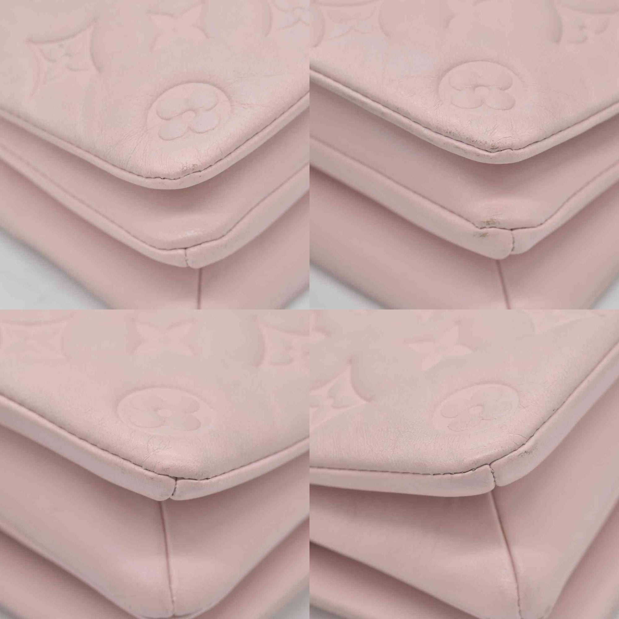 $2840 Louis Vuitton Monogram Embossed Pochette Coussin