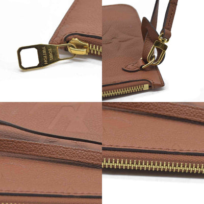 $2940 Louis Vuitton  Empreinte Monogram Giant Neverfull MM Pochette Cognac