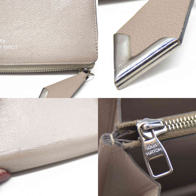 $1420 Louis Vuitton  Veau Cachemire Comete Wallet Galet MI5126