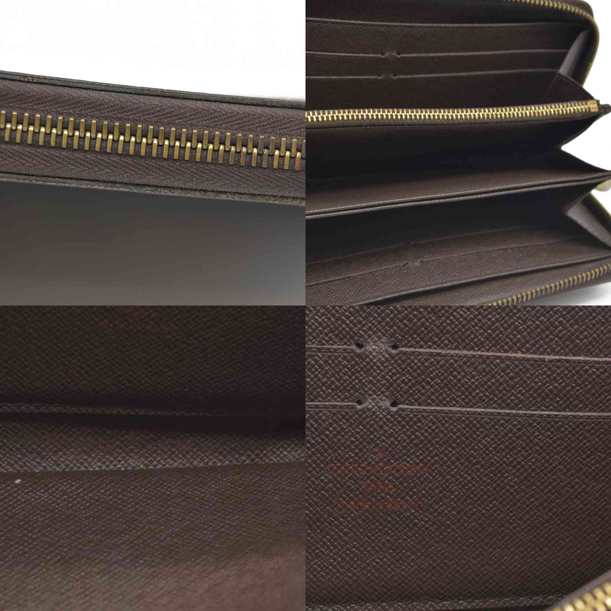 AUCTION $915 Louis Vuitton Damier Ebene Zippy Wallet