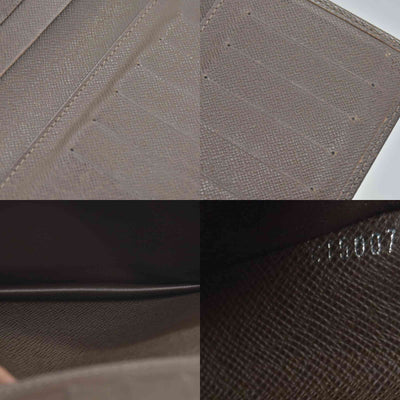 $835 Louis Vuitton Taiga Brown Leather Bifold Wallet CONSIGNMENT