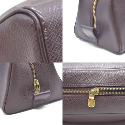Louis Vuitton  Taiga Trousse Toilette PM Acajou