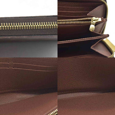 $915 Louis Vuitton  Monogram Zippy Wallet