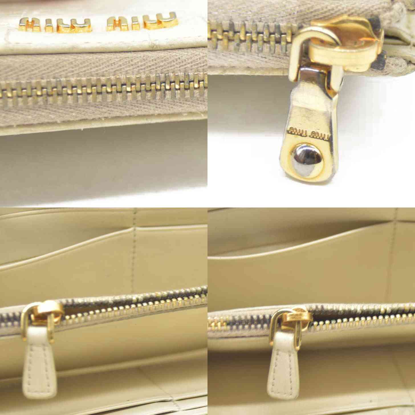 MIU MIU Logo Embossed Leather Zippy Long Wallet White