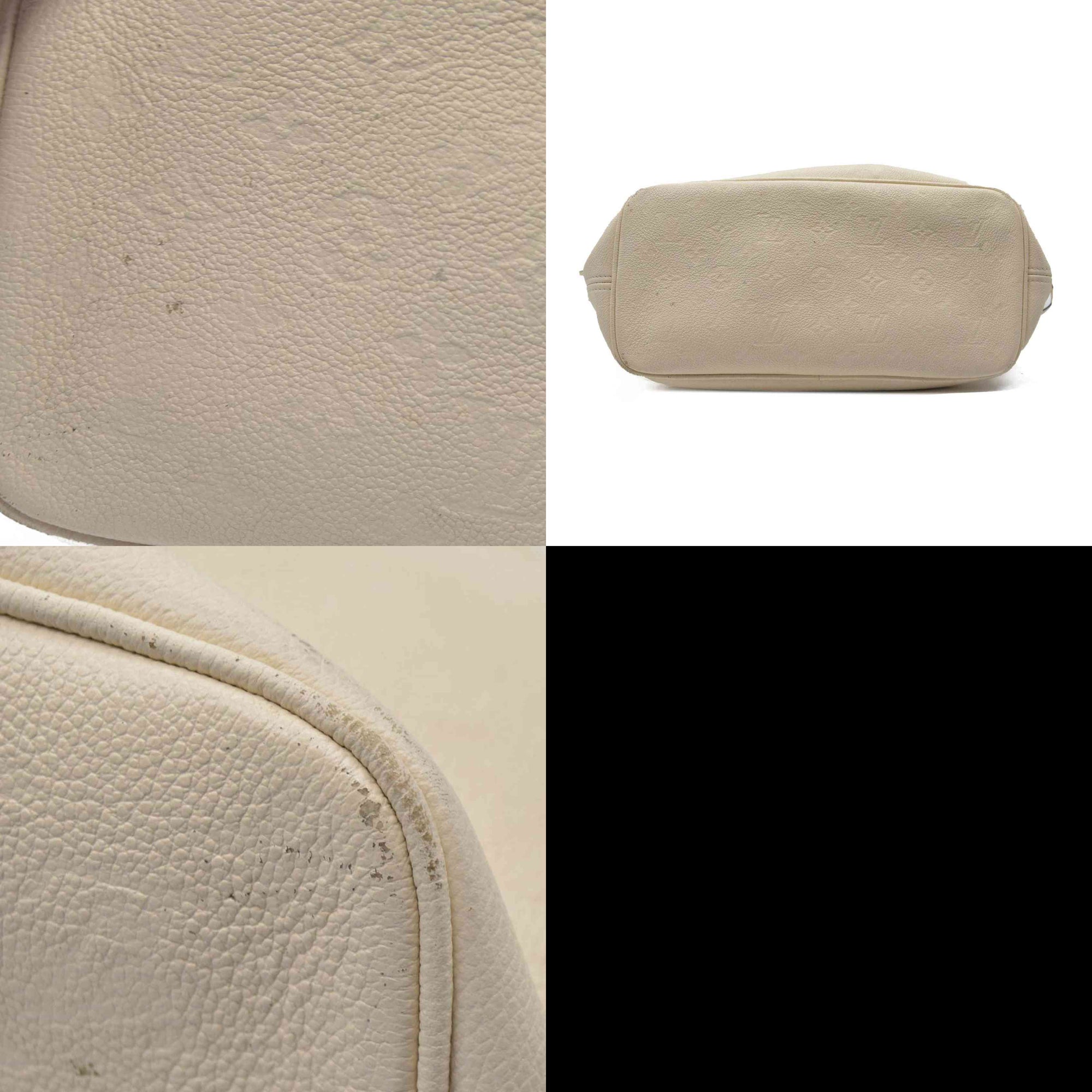 $2710 Louis Vuitton Monogram Giant Empreinte Neverfull MM