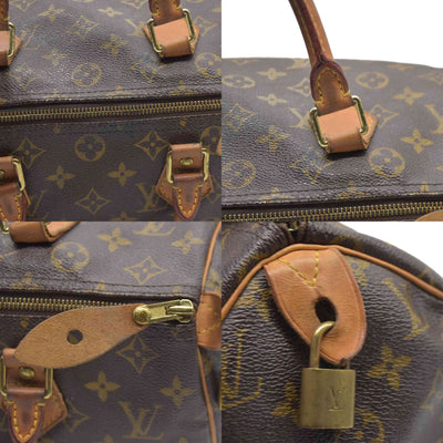 $1550 Louis Vuiton Monogram Speedy 30 SD1193