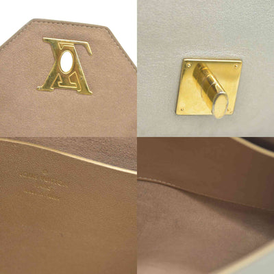 AUCTION $2150 Louis Vuitton  Metallic Calfskin Love Note Gold Bronze