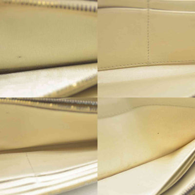 MIU MIU Logo Embossed Leather Zippy Long Wallet White