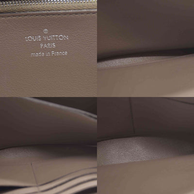 $1420 Louis Vuitton  Veau Cachemire Comete Wallet Galet MI5126