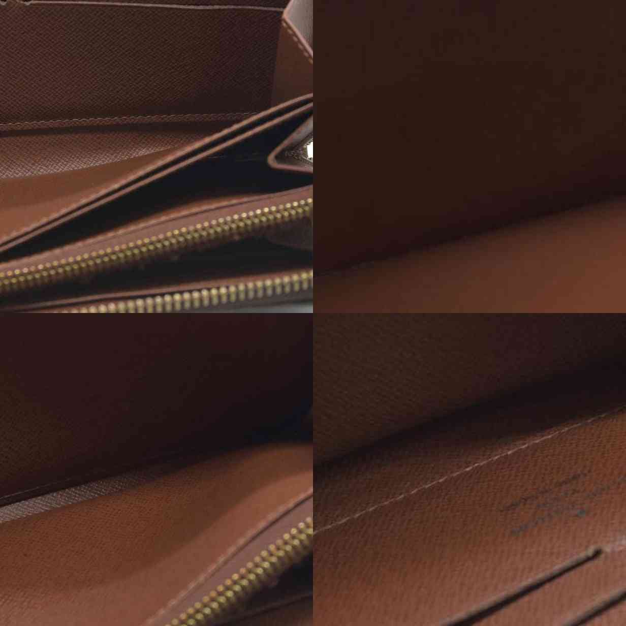 AUCTION $915 Louis Vuitton  Monogram Zippy Wallet CA5039