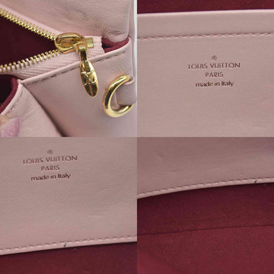 $2840 Louis Vuitton Monogram Embossed Pochette Coussin