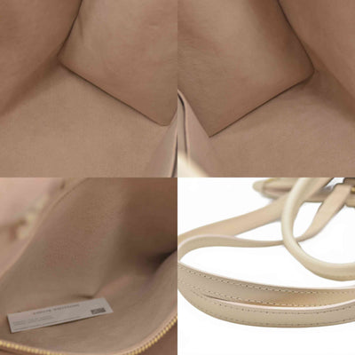 $3500 Louis Vuitton Rose Trianon/Creme Monogram Giant Empreinte Leather Onthego MM Bag