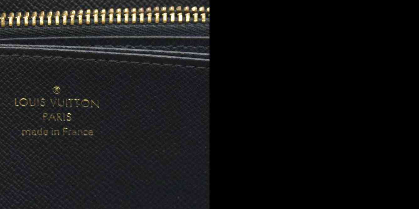 $915 CONSIGNMENT Louis Vuitton  Reverse Monogram Giant Zippy Wallet LU4220