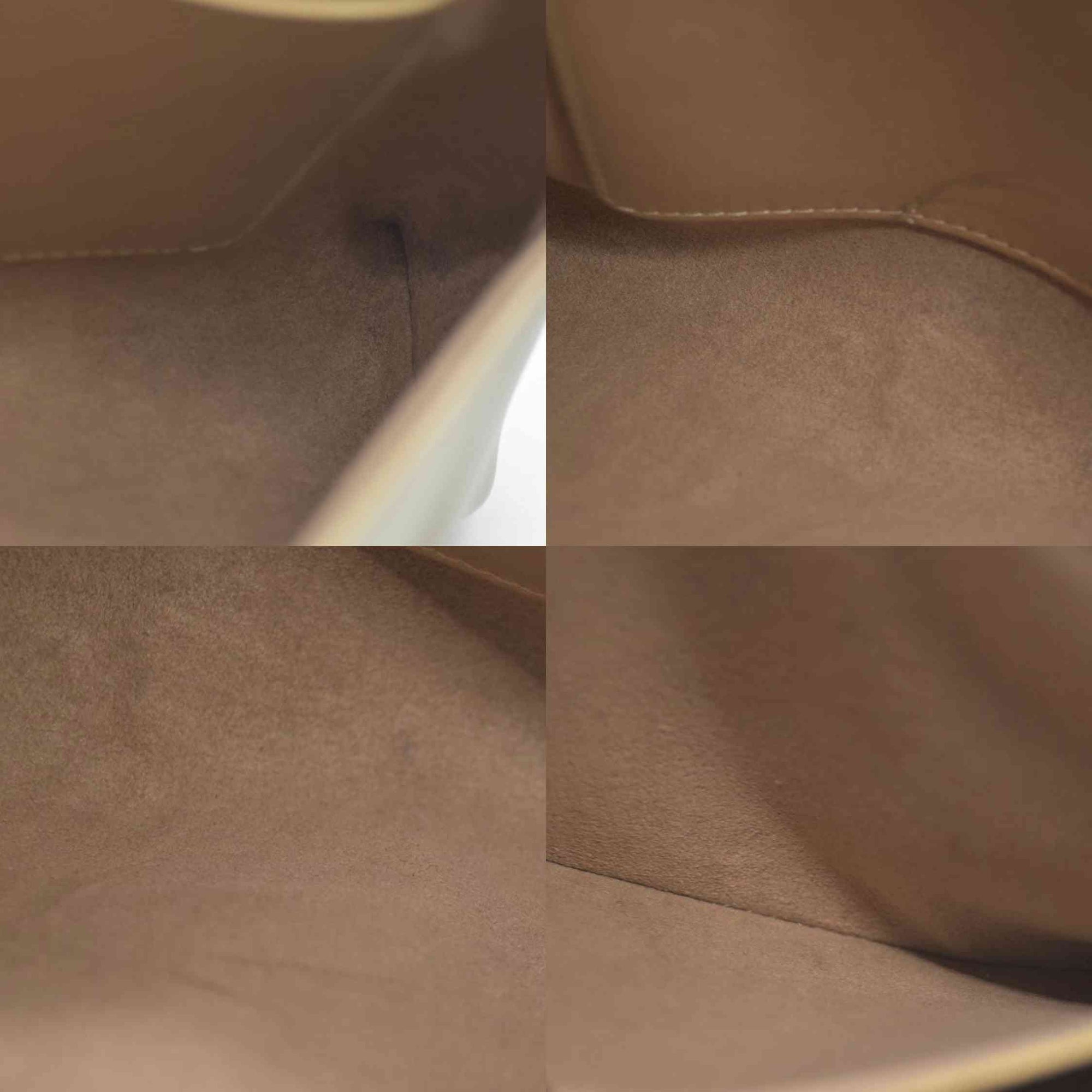 AUCTION $2150 Louis Vuitton  Metallic Calfskin Love Note Gold Bronze