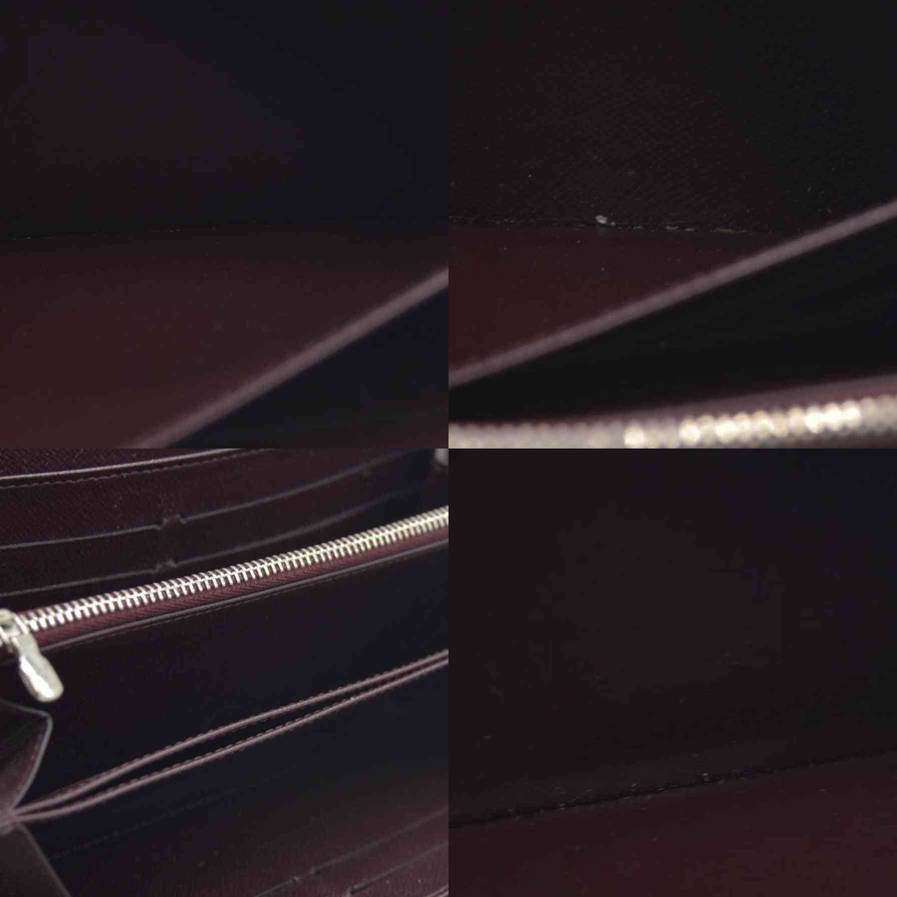 AUCTION $970 Louis Vuitton  Epi Electric Zippy Wallet Prune