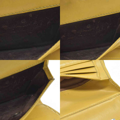 Salvatore Ferragamo Gancini Leather Trifold Wallet Yellow