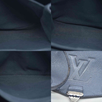 $3100 Louis Vuitton Metallic Empreinte Monogram Giant Pochette Metis Navy Nacre