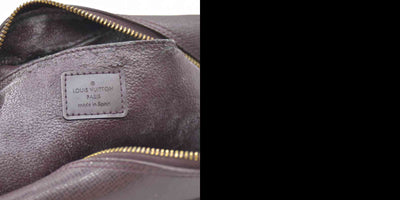 Louis Vuitton  Taiga Trousse Toilette PM Acajou