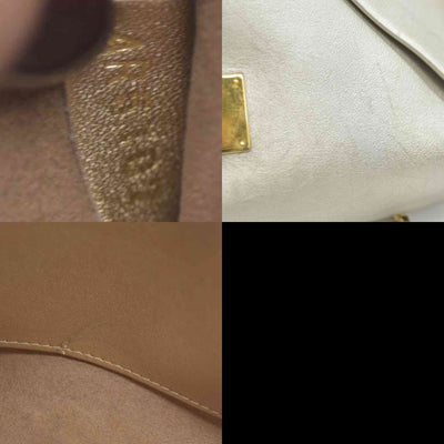 AUCTION $2150 Louis Vuitton  Metallic Calfskin Love Note Gold Bronze