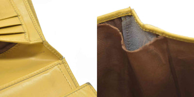 Salvatore Ferragamo Gancini Leather Trifold Wallet Yellow