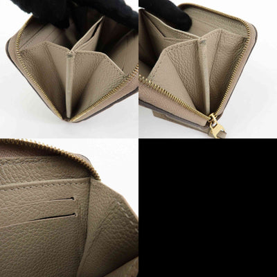 $760 Louis Vuitton Monogram Empreinte Round Zippy Coin Case Beige RFID