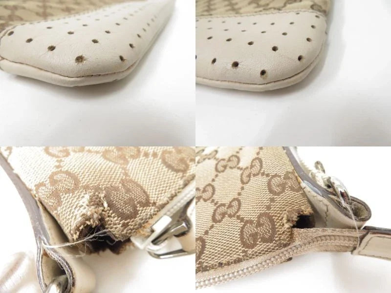 $1150 Gucci Perforated GG Leather Crossbody Messenger Bag