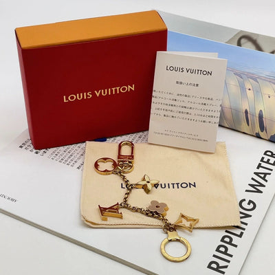 $675 Louis Vuitton Fleur de Monogram Bag Charm Chain Gold Beige