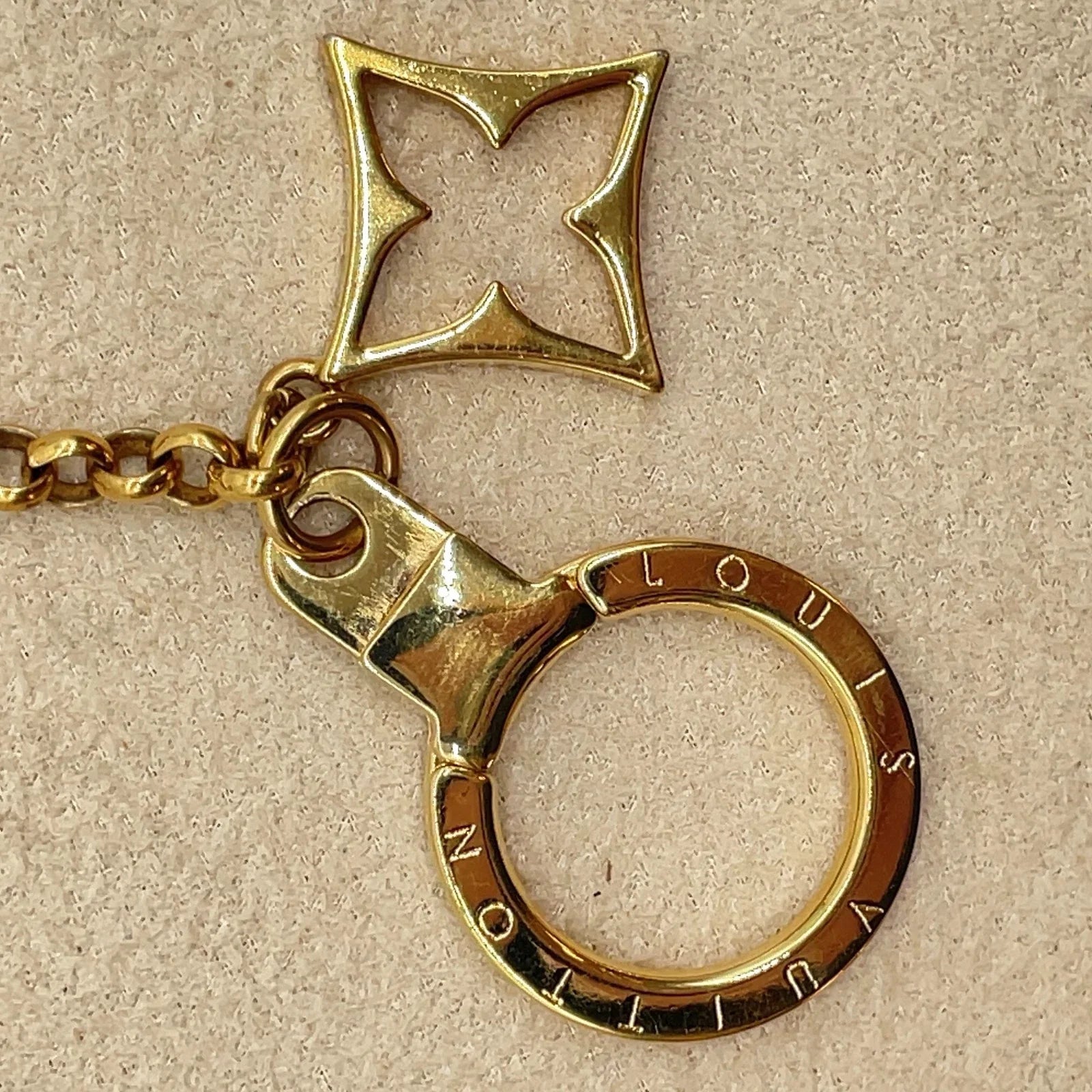 $675 Louis Vuitton Fleur de Monogram Bag Charm Chain Gold Beige