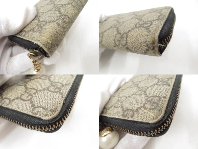 GUCCI GG Supreme PVC Zip Around Compact Zippy Wallet