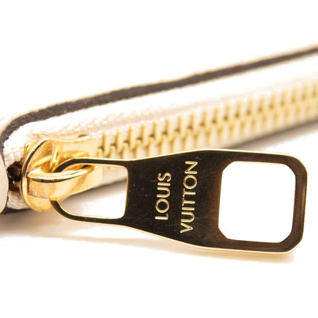 Louis Vuitton Empreinte Monogram Giant Neverfull MM Pochette Cream