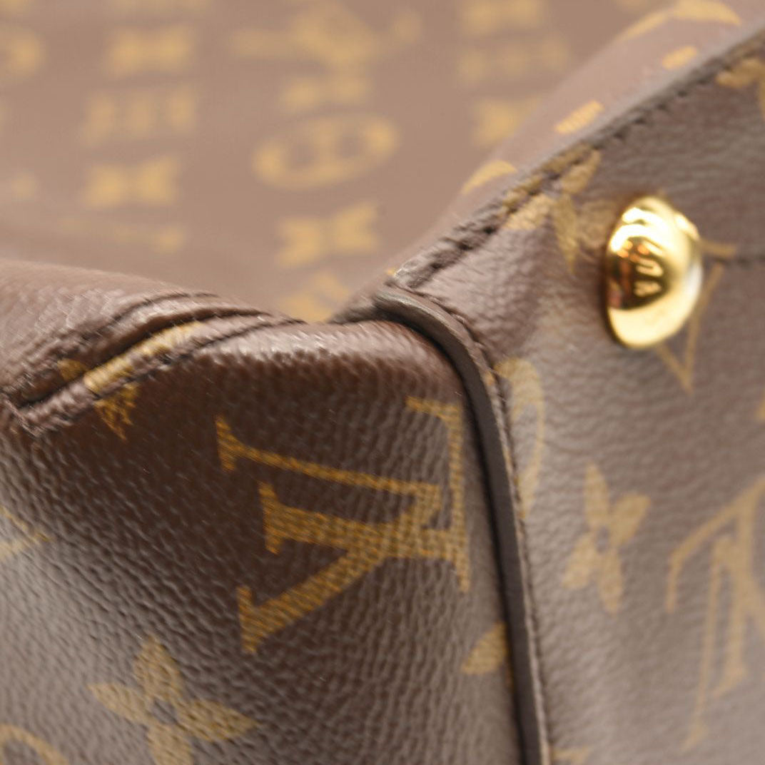 $2910 LOUIS VUITTON Monogram Montaigne GM