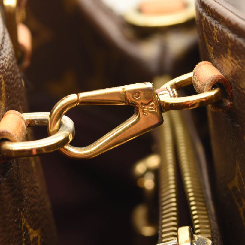 $2910 LOUIS VUITTON Monogram Montaigne GM