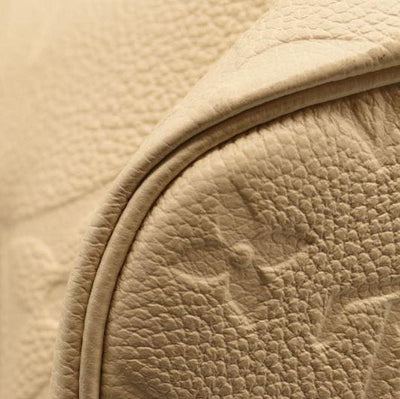 LOUIS VUITTON Empreinte Monogram Giant Neverfull MM Cream