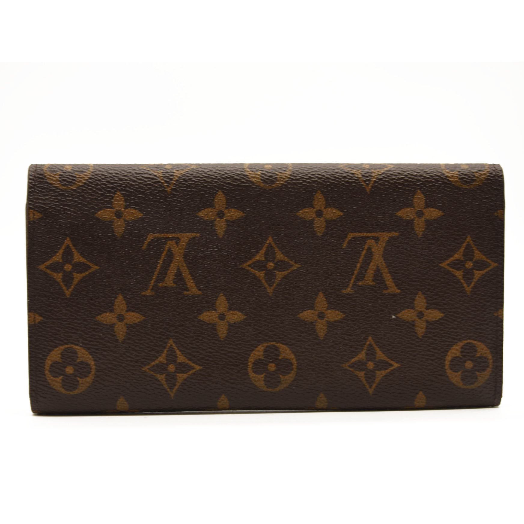 Louis Vuitton Emilie Wallet in fuchsia. Love it - and it holds my