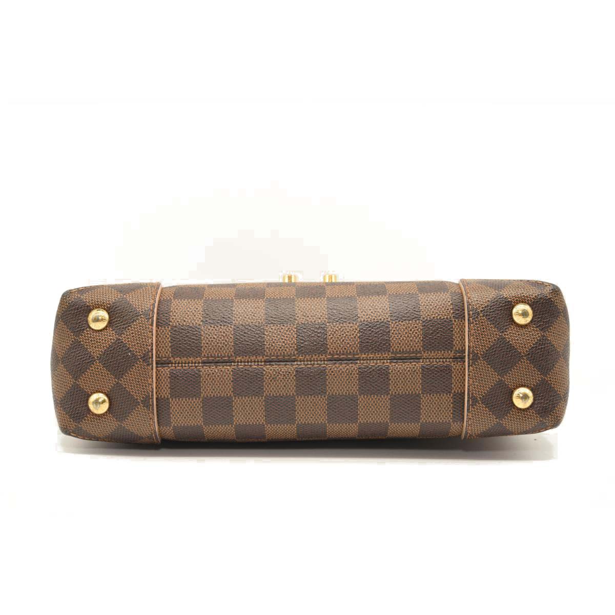 LOUIS VUITTON Damier Ebene Caissa Clutch in Rose Ballerine