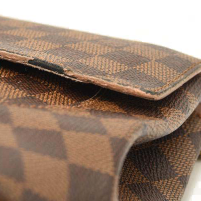 LOUIS VUITTON Damier Ebene Caissa Clutch in Rose Ballerine